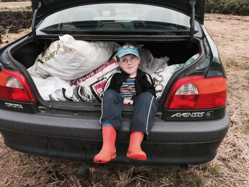 Taking a break from turf loading at the local bog
