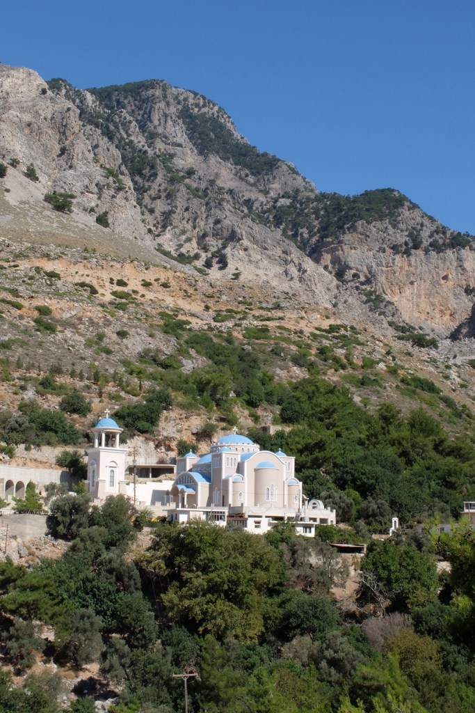 We walked past the Agios Nikolaos Monastery on our walk up into the St Nikolaos-Rouvas Gorge. On the way back we were motioned into Monastery by a local gent who was very keen on Ruth. The Priest got us to sit with him in the shade of a tree, we were offered biscuits and a Raki (Cliff only). Host responsibility, he knew Ruth had to get back down the mountain. 