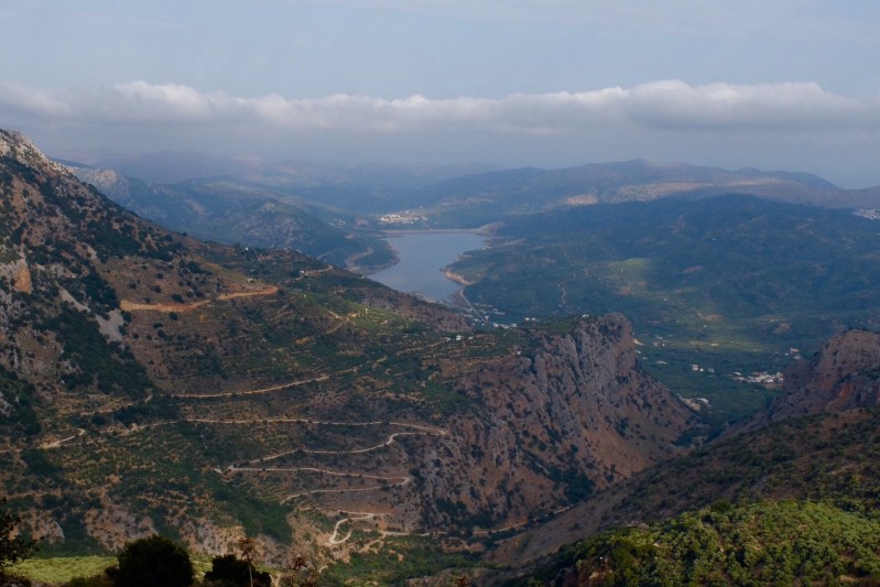 My eyes were firmly fixed on the road which was barely wide enough for two cars to pass, Ruth's were fixed on the barrier the distance the car would tumble. When I finally stopped and looked at how high we were I was not sure whether to lose my nerve or not. A couple of days earlier we had found ourselves on a single lane road with no barrier to stop the drop. Heading up to the Lasithi Plateau - the alternate route was said to be a little more challenging.