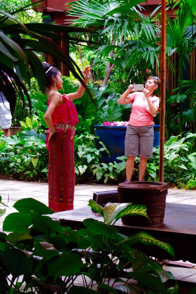 Ruth responds to the Thai dancing by giving a rendition of the tourist camera dance