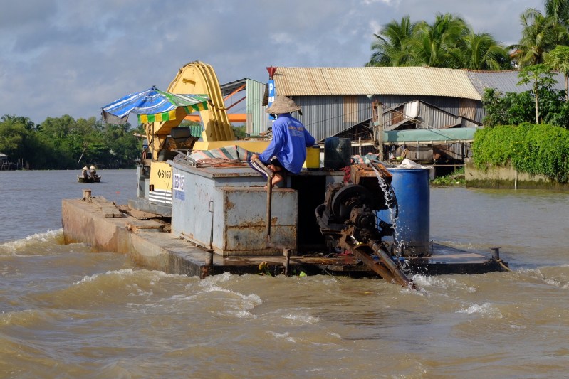 A local earthmoving contractor on the Mekong.